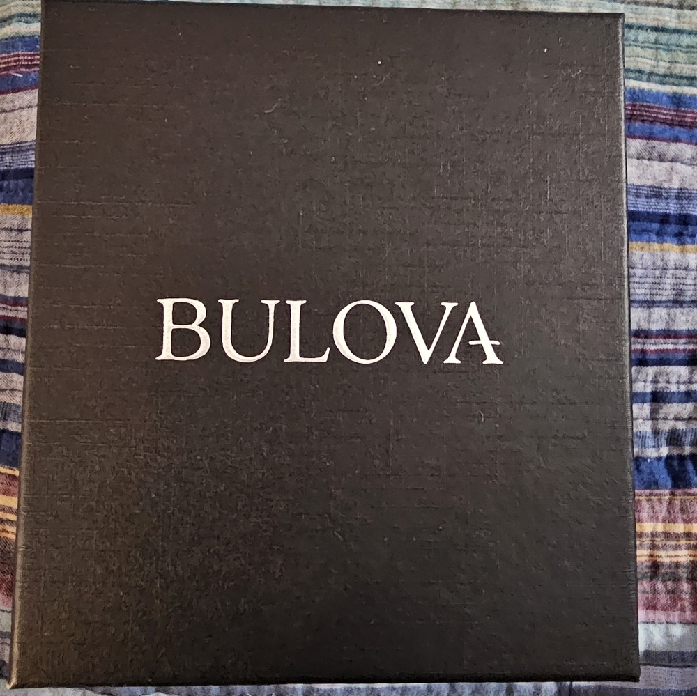 Bulova 12 diamond mother of pearl face watch